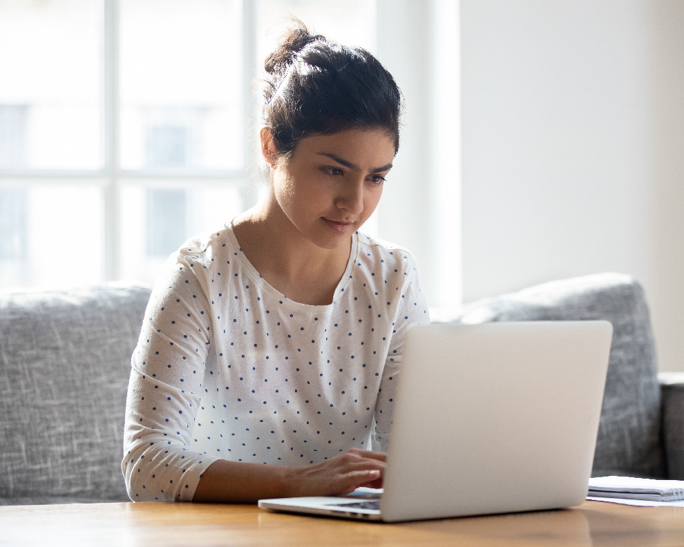 Young Indian woman having anxiety therapy online